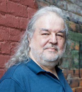 Greg Ioannou headshot.